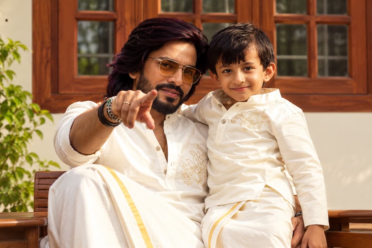 Father and son in traditional wear